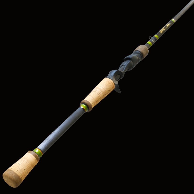 Fishing rod with cork handles profile on a black background.