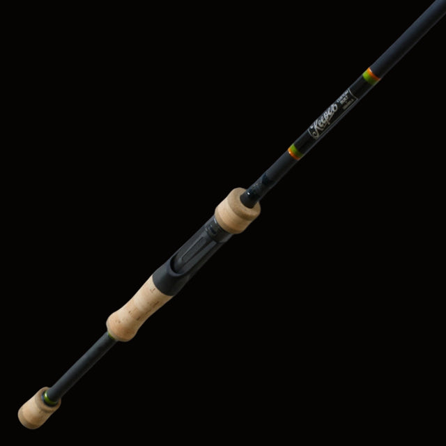 Fishing rod with cork  handle on a black background Keeper rods Coosa Series