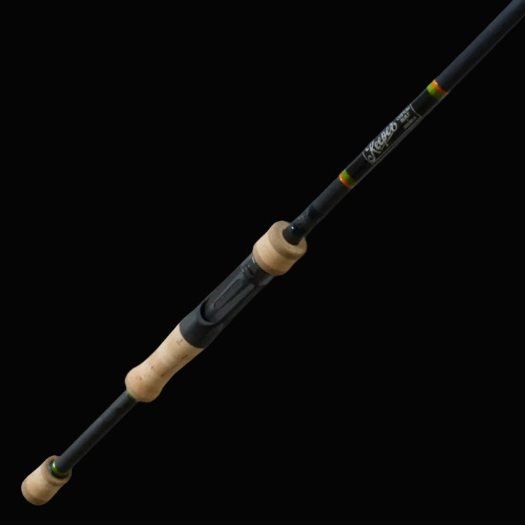 Fishing rod with cork handle on a black background Keeper rods Coosa Series
