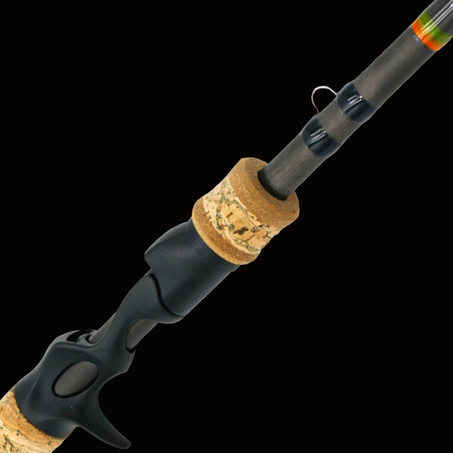 Fishing rod with cork handle on a white background