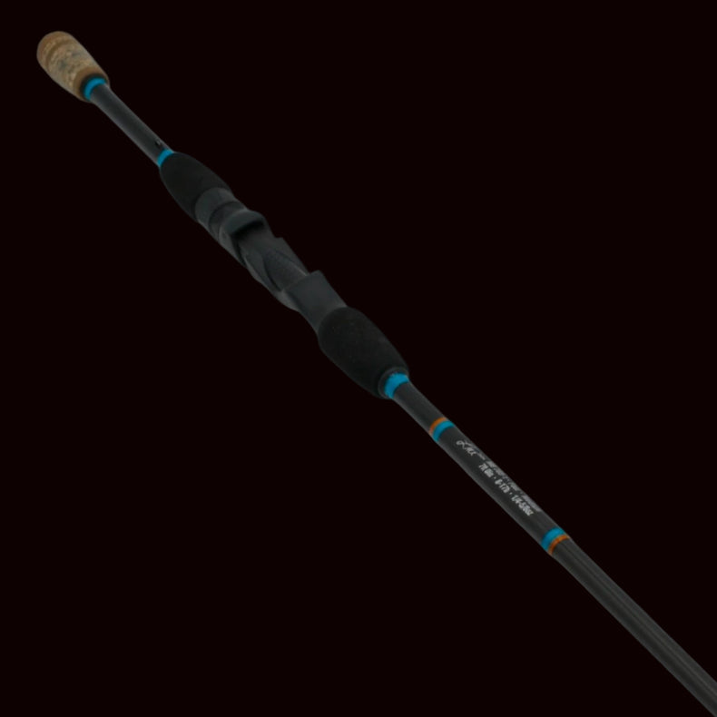 The Keeper Rods-Rouser Rouser 7'0" Medium Fast Spin Your Do-It-All Spinning Rod features a black design with a cork handle and blue accent rings—ideal for Alabama anglers seeking versatility.