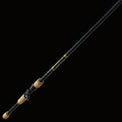 Fishing rod with black and wooden handle on a light gray background