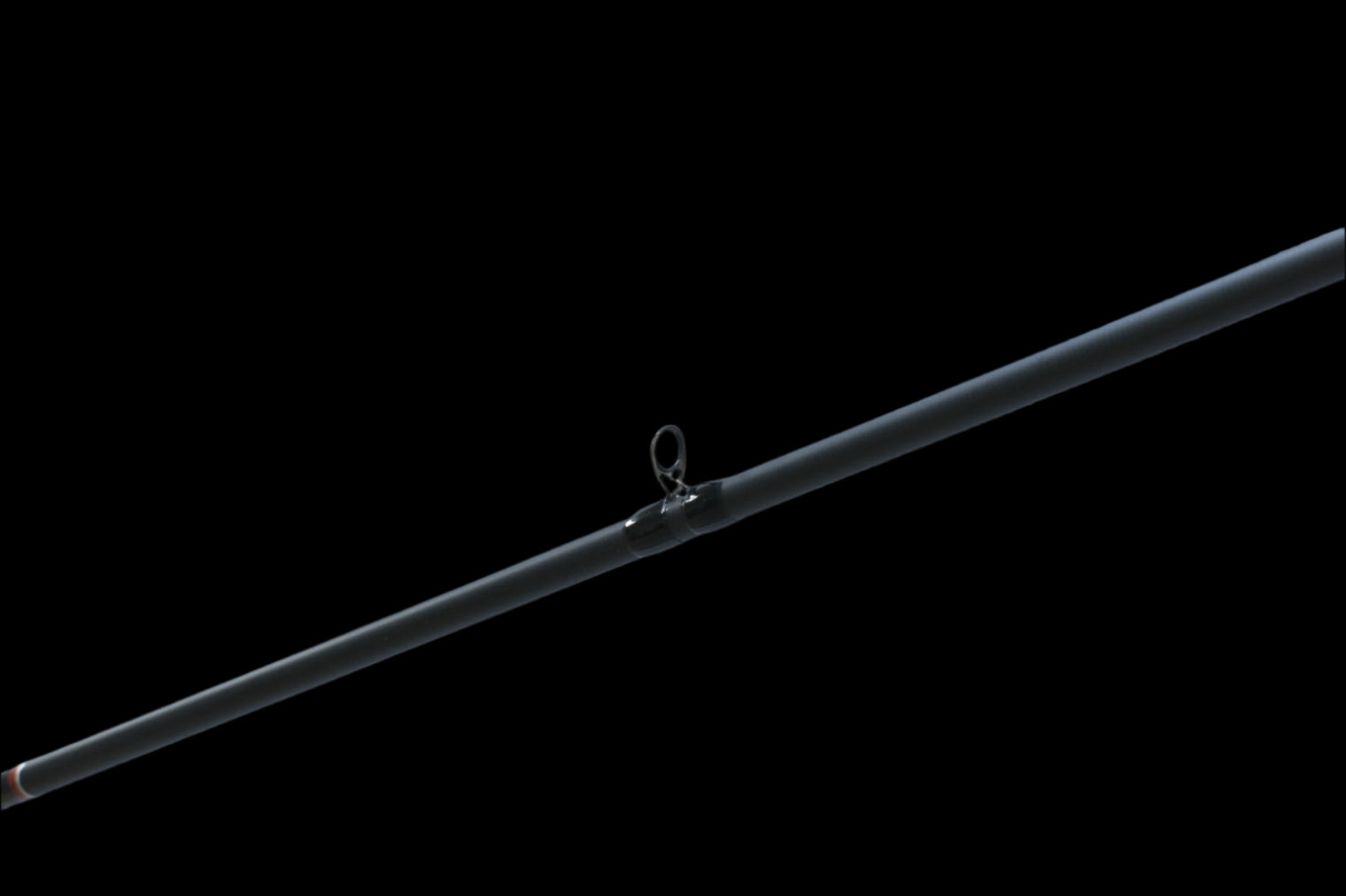 The Doozie Series 72 MH X-Ray Precision Power Heavy Cover Rod by Keeper Rods-Doozie is a black fishing rod with red accents and a cork handle, highlighted against a black background. Its sleek design features multiple eyelets, making it perfect for bass fishing enthusiasts.