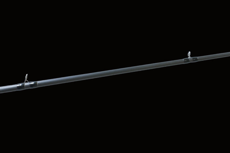 A close-up of the Keeper Rods-Doozie Doozie 7'6" Pitching/C-Rig Heavy Mod-Fast Precision Casting Rod against a plain, light background, showcasing the rod and two metal line guides.