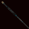 The Keeper Rods-Rouser Rouser 7'0" Medium Fast Spin Your Do-It-All Spinning Rod features a black design with a cork handle and blue accent rings—ideal for Alabama anglers seeking versatility.
