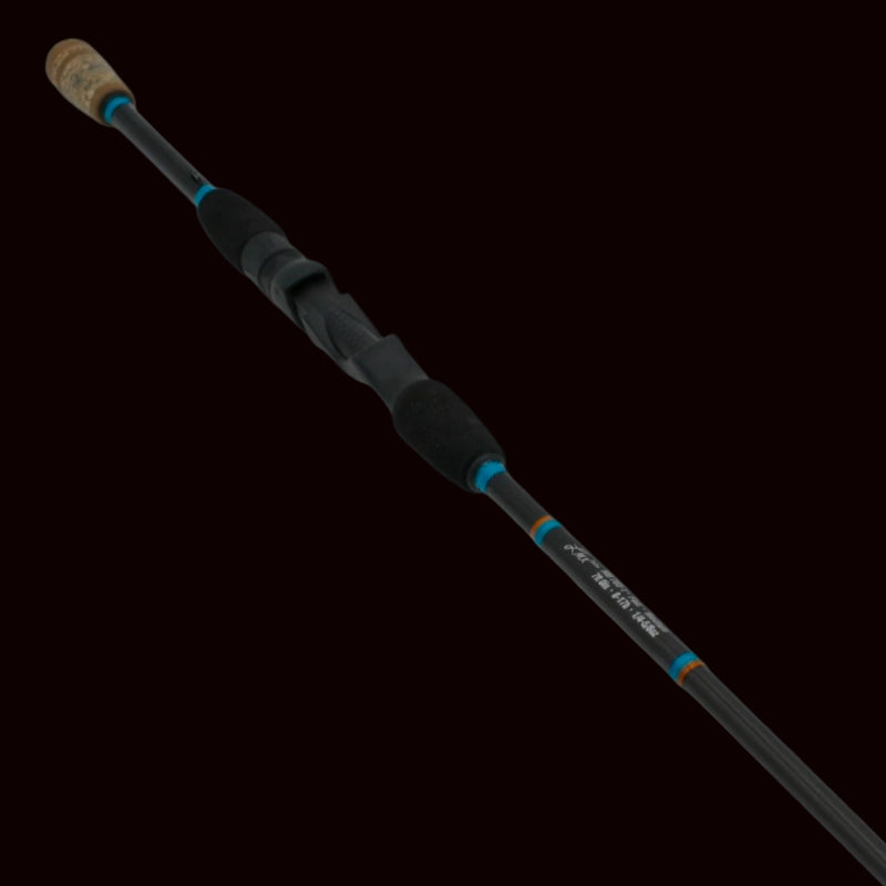 The Keeper Rods-Rouser Rouser 7'0" Medium Fast Spin Your Do-It-All Spinning Rod features a black design with a cork handle and blue accent rings—ideal for Alabama anglers seeking versatility.